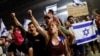 Protesters block Ayalon Highway during a demonstration following a parliament vote on a contested bill that limits Supreme Court powers to void some government decisions, in Tel Aviv, July 25, 2023. 