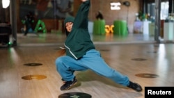 U.S. breakdancer Logan Edra performs a sequence of dance moves at Playground LA in Los Angeles, California, U.S., June 11, 2024. (REUTERS/Mike Blake)