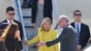 US first lady Jill Biden (C) is welcomed as she arrives to celebrate the US rejoining UNESCO, at the Orly Airport in Orly, Paris' suburb, on July 24, 2023. 