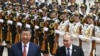 Президент Росії Володимир Путін і президент Китаю Сі Цзіньпін на офіційній церемонії зустрічі перед Народним залом на площі Тяньаньмень у Пекіні, 16 травня 2024 року. (Сергій Бобильов/Sputnik/viaAFP)
