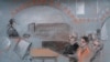 This courtroom drawing shows Massachusetts Air National Guardsman Jack Teixeira, seated second from right, appearing in U.S. District Court in Boston, Massachusetts, April 19, 2023.