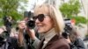 FILE - E. Jean Carroll arrives at Manhattan Federal Court, in New York, May 9, 2023. 