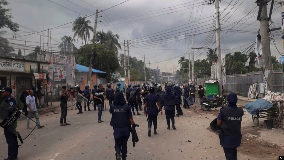 Bangladeshi police and activists of the opposition Bangladesh Nationalist Party clash in Habiganj, Bangladesh, Aug.19, 2023. The party says its leaders and activists have faced trumped-up charges under the government's security law. 