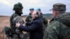 Архівне фото: російський президент Путін спілкується з російськими мобілізованими, жовтень 2022 року
