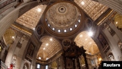 Pope Francis attends the Celebration of the Lord's Passion in Saint Peter's Basilica at the Vatican, March 29, 2013.