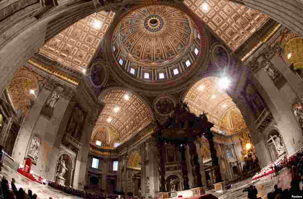 Pope Francis attends the Celebration of the Lord's Passion in Saint Peter's Basilica at the Vatican, March 29, 2013.