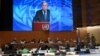 U.N. Secretary-General Antonio Guterres appears on a screen as he delivers a speech at the opening of a session of the U.N. Human Rights Council, following the Russian invasion in Ukraine, in Geneva, Switzerland, Feb. 28, 2022.