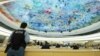 A U.N. security officer stands guard during a special session on the situation in Ukraine of the Human Rights Council at the United Nations in Geneva, Switzerland, March 4, 2022.