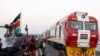 FILE - A Standard Gauge Railway cargo train rides from the port container depot on a Chinese-backed railway costing nearly $3.3 billion, opened by Kenya's president as one of the country's largest infrastructure projects since independence, in Mombasa, Kenya, May 30, 2017.