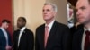 Rep. Kevin McCarthy, R-Calif., talks to reporters as he walks to the House chamber as the House meets for the third day to elect a speaker and convene the 118th Congress in Washington, Jan. 5, 2023. 
