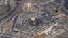 FILE - The Pentagon is seen from Air Force One as it flies over Washington, March 2, 2022. 