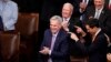 U.S. Rep. Kevin McCarthy, R-Calif., smiles after winning the 15th vote in the House chamber as the House enters the fifth day trying to elect a speaker and convene the 118th Congress in Washington, Jan. 7, 2023.