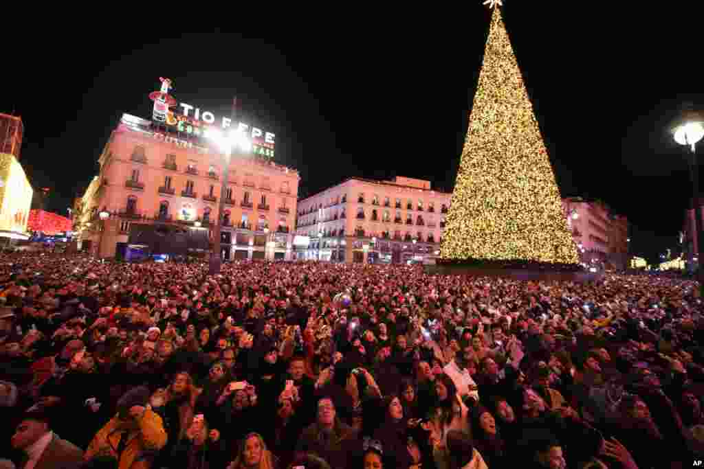 People celebrate during New Year's celebrations at Madrid's Puerta del Sol square in downtown Madrid, Spain, Jan. 1, 2025.