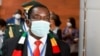 FILE - President of Zimbabwe Emmerson Mnangagwa arrives to attend the opening ceremony of the 35th ordinary session of the Assembly of the African Union at the African Union Commission (AUC) headquarters in Addis Ababa, Ethiopia. February 5, 2022.