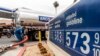 A gas tank driver delivers 8,500 gallons of gasoline at an ARCO gas station in Riverside, Calif., May 28, 2022. (