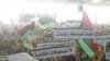 Members of the Libyan National Army rally to call for the National Transitional Council to stop marginalizing the role of the national army in Benghazi, Libya, March 4, 2012. 