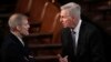 Rep. Jim Jordan, left, talks with Rep. Kevin McCarthy in the House chamber as the House meets for a second day to elect a speaker and convene the 118th Congress in Washington, Jan. 4, 2023.