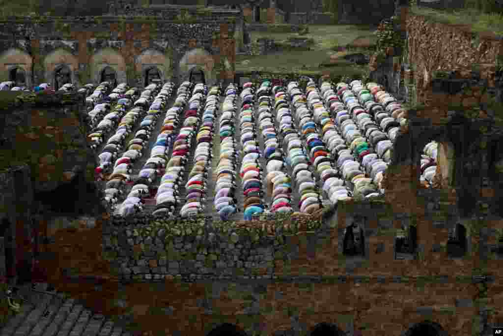 Indian Muslims offer Eid al-Adha prayers at the 14th century Feroz Shah Kotla Jami Mosque in New Delhi, India, Sept. 2, 2017.