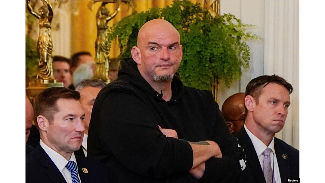 U.S. Senator John Fetterman, a Democrat, attends an event where President Donald Trump signed the Laken Riley Act, legislation requiring the detention of immigrants living in the U.S. illegally who are accused of a crime, at the White House in Washington on Jan. 29, 2025.