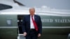 FILE - President Donald Trump walks from Marine One to board Air Force One, at Andrews Air Force Base, Maryland, May 14, 2020.