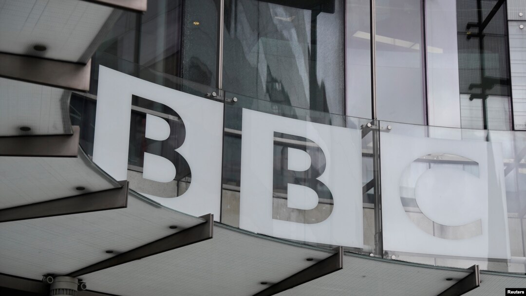 FILE - Signage is seen at BBC offices and recording studios, in London, Britain, May 21, 2021.