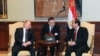 Egyptian President Abdel-Fattah el-Sissi, right, talks to Russian President Vladimir Putin during their meeting in Cairo, Egypt, Feb. 09, 2015. 