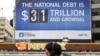 A billboard showing the U.S. national debt is seen in Washington, D.C., Jan. 19, 2023.
