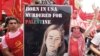 Lebanese anti-American protesters display a poster of peace activist Rachel Corrie during a demonstration near the U.S. Embassy in Aukar northeast of Beirut, Lebanon, June 6, 2010.