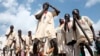 People from Benishangul Gumuz regional state in southern Ethiopia present a cultural dance in Addis Ababa, Dec. 9, 2008. 