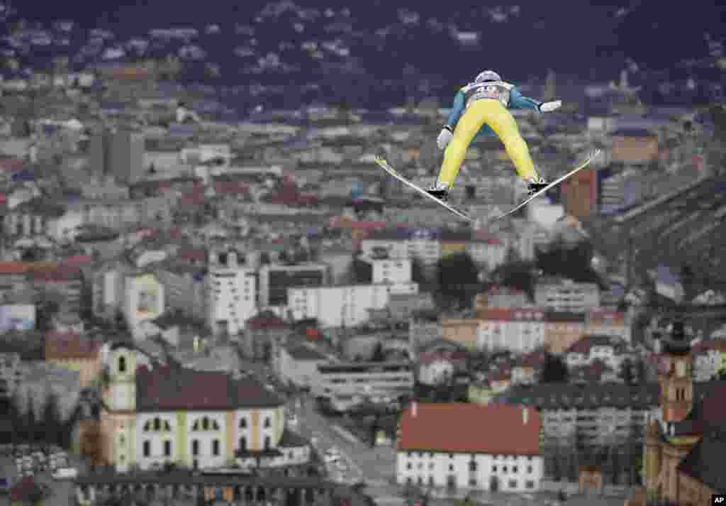 Switzerland's Gregor Deschwanden makes an attempt in the qualification for the third stage of the Four Hills Ski Jumping event at the ski jump in Innsbruck, Austria.