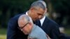 U.S. President Barack Obama (L) hugs atomic bomb survivor Shigeaki Mori as he visits Hiroshima Peace Memorial Park in Hiroshima, Japan, May 27, 2016.