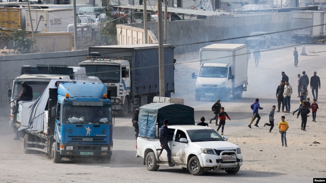 Trucks carrying aid arrive, amid the ongoing conflict between Israel and the Palestinian Islamist group Hamas, in Rafah in the southern Gaza Strip Jan. 17, 2024. 