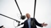 President Donald Trump speaks to the press before boarding Air Force One in Andrews Air Force Base, Md., March 28, 2020.