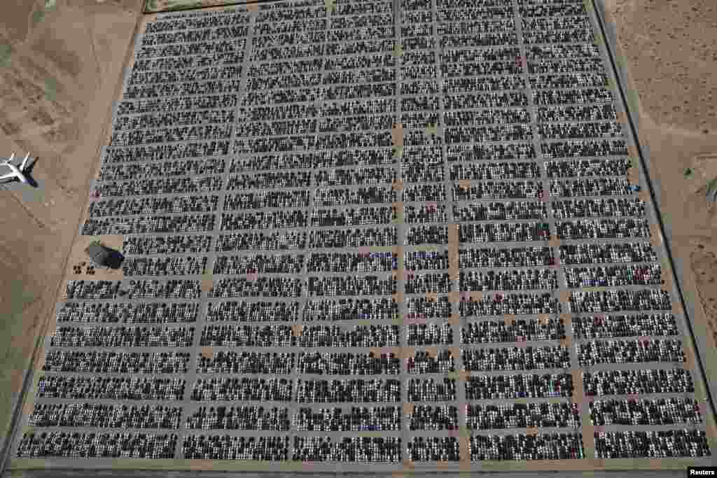 Reacquired Volkswagen and Audi diesel cars sit in a desert graveyard near Victorville, California, March 28, 2018.