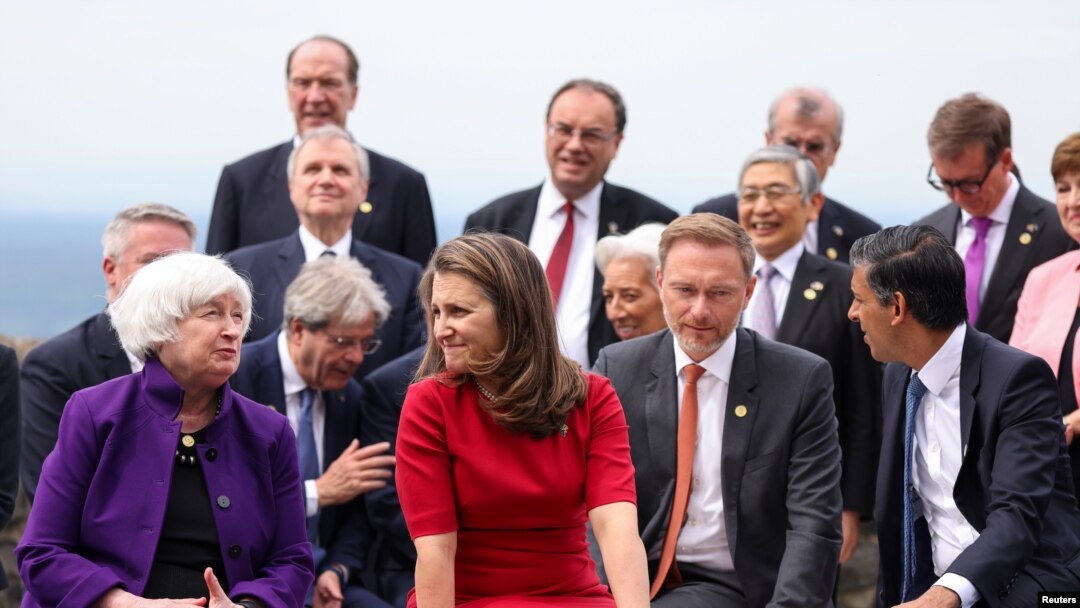 
Canada's Finance Minister Chrystia Freeland and , U.S. Treasury Secretary Janet Yellen, left, , talk as they gather to pose for a photo during the G7 Summit in Koenigswinter, Germany on May 19, 2022.