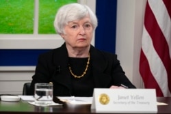 FILE - Treasury Secretary Janet Yellen listens during a meeting in the South Court Auditorium on the White House campus, Oct. 6, 2021, in Washington.