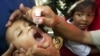 FILE - An Indonesian boy is given polio vaccine in Jakarta, Indonesia.