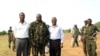 A picture released by Thabo Mbeki's spokesman shows former President of Burundi Pierre Buyoya and AU mediator for the Sudan crisis Thabo Mbeki with Sudan People's Liberation Army (SPLA) commander, Abdel Aziz al-Hilu (C), at his military headquarters in S