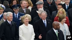Former President George W. Bush, right, his wife Laura, Former Secretary of State Hillary Clinton and Former President Bill Clinton wait for the 58th Presidential Inauguration for President-elect Donald Trump at the U.S. Capitol in Washington, Jan. 20, 20