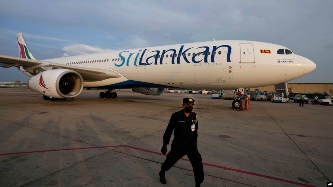 FILE - A SriLankan Airlines plane arrives in Colombo, Sri Lanka, Dec. 6, 2021. Sri Lanka's national airline on Feb. 27, 2024, blamed a rat for grounding a plane for three days, causing delays.