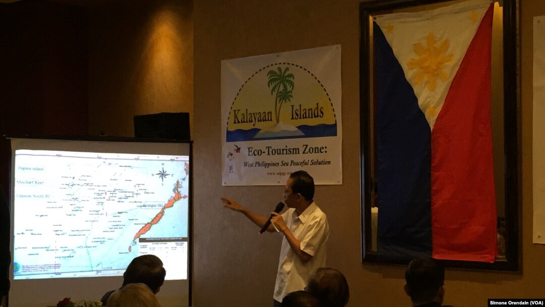 Mayor Eugenio Bito-onon of the Kalayaan Group of Islands, the Philippines-controlled Spratly Islands, points out the Philippines' claims in the Spratlys during a fundraising dinner to gain support for a proposed "ecotourism zone."