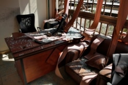 Damage is seen inside the media office of the Lebanese Hezbollah group in a southern suburb of Beirut, Lebanon, Aug. 25, 2019.
