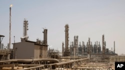 FILE - An oil facility in Jubeil, about 600 kilometers (370 miles) from Riyadh, Saudi Arabia, May. 3, 2009. 