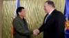 Philippine President Rodrigo Duterte, left, greets U.S. State Secretary Mike Pompeo upon arrival at Villamor Air Base in suburban Pasay city southeast of Manila, Philippines, Thursday, Feb. 28, 2019. 