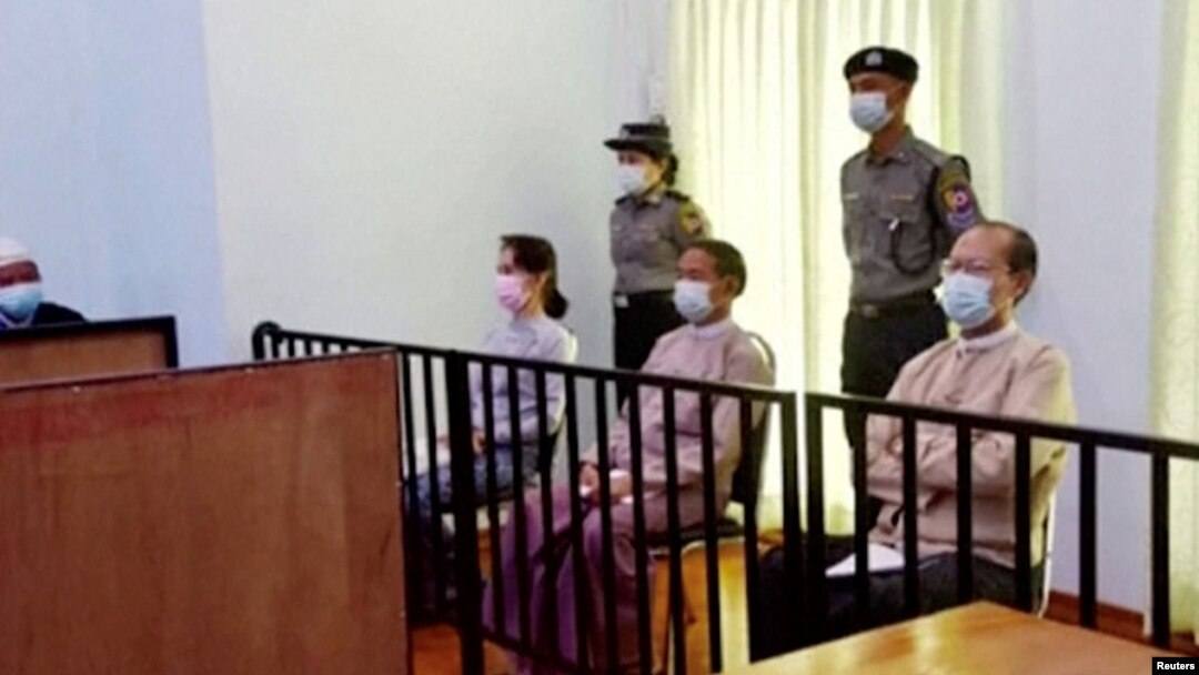 Myanmar's ousted leader Aung San Suu Kyi, former president Win Myint and doctor Myo Aung appear at a court in Naypyitaw, Myanmar May 24, 2021, in this still image taken from video. (MRTV/REUTERS TV/via REUTERS)