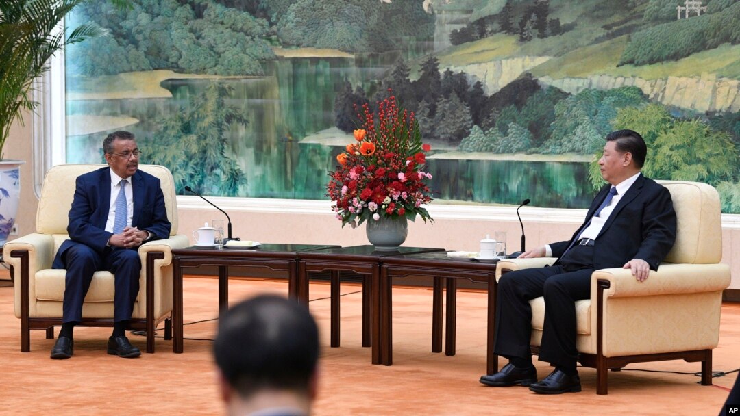 Tedros Adhanom, director general of the World Health Organization, left, meets with Chinese President Xi Jinping at the Great Hall of the People in Beijing, Jan. 28, 2020. 