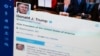 FILE - A photo of then-President Donald Trump's Twitter feed on a computer screen in Washington. 