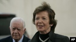 FILE - Former Irish President Mary Robinson, right, and former U.S. President Jimmy Carter speak to press in the West Bank city of Ramallah, Oct. 20, 2010.