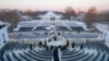 FILE - Members of the U.S. military are on stage during a rehearsal at the U.S. Capitol ahead of President-elect Donald Trump's upcoming inauguration in Washington, Jan. 12, 2025.