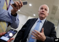 Senate Armed Services Committee Chairman Sen. John McCain, R-Ariz., speaks to reporters on Capitol Hill in Washington, March 8, 2017.